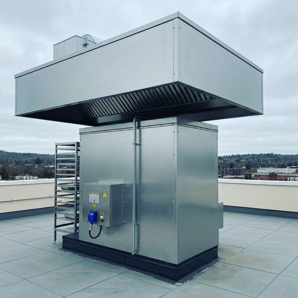 After cleaning: rooftop commercial kitchen exhaust fan in Morgantown, WV with grease removed from fan surfaces
